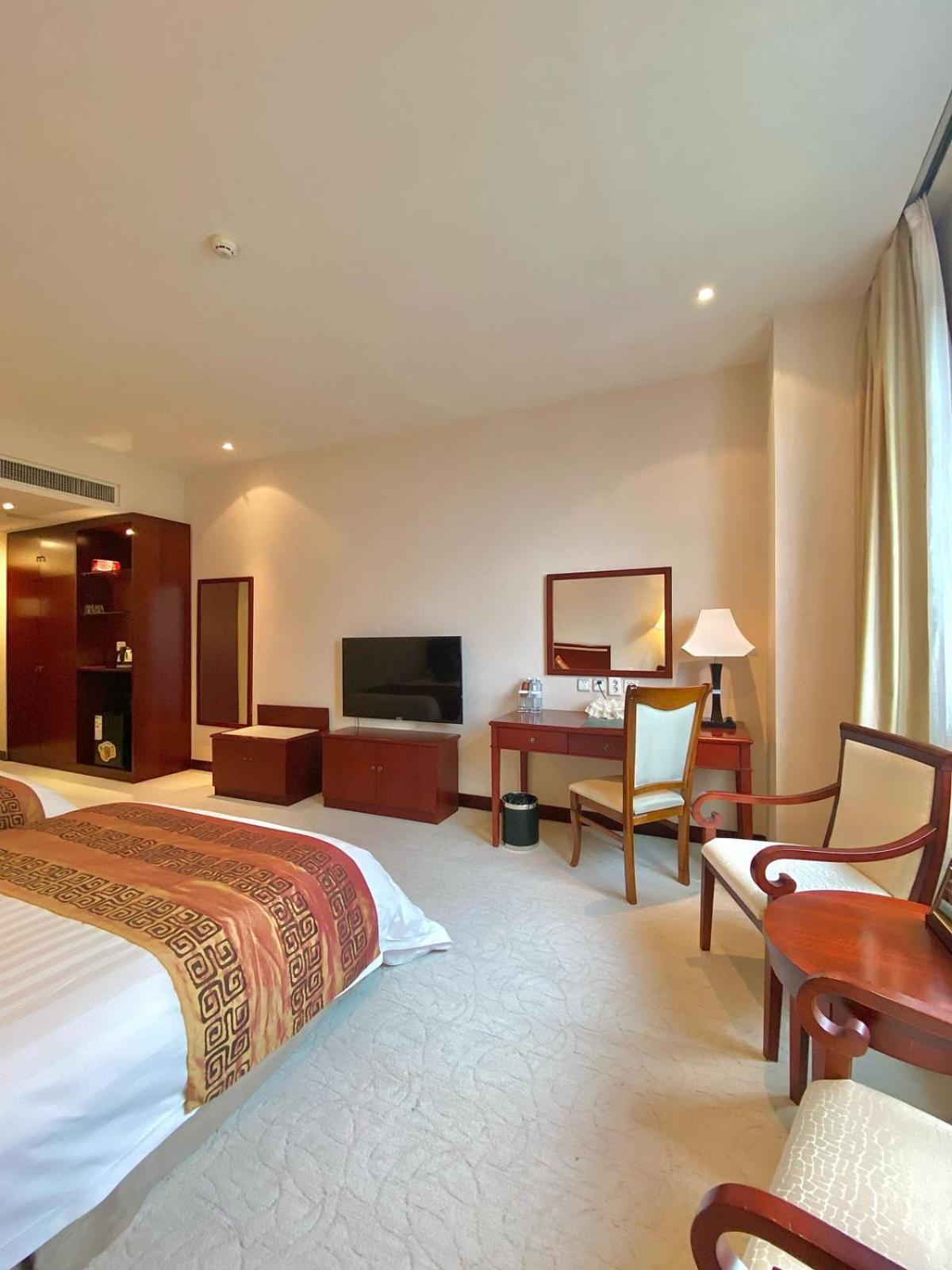 فندق بكين بلاس سولوكسي أستانا المظهر الخارجي الصورة A room at the hotel